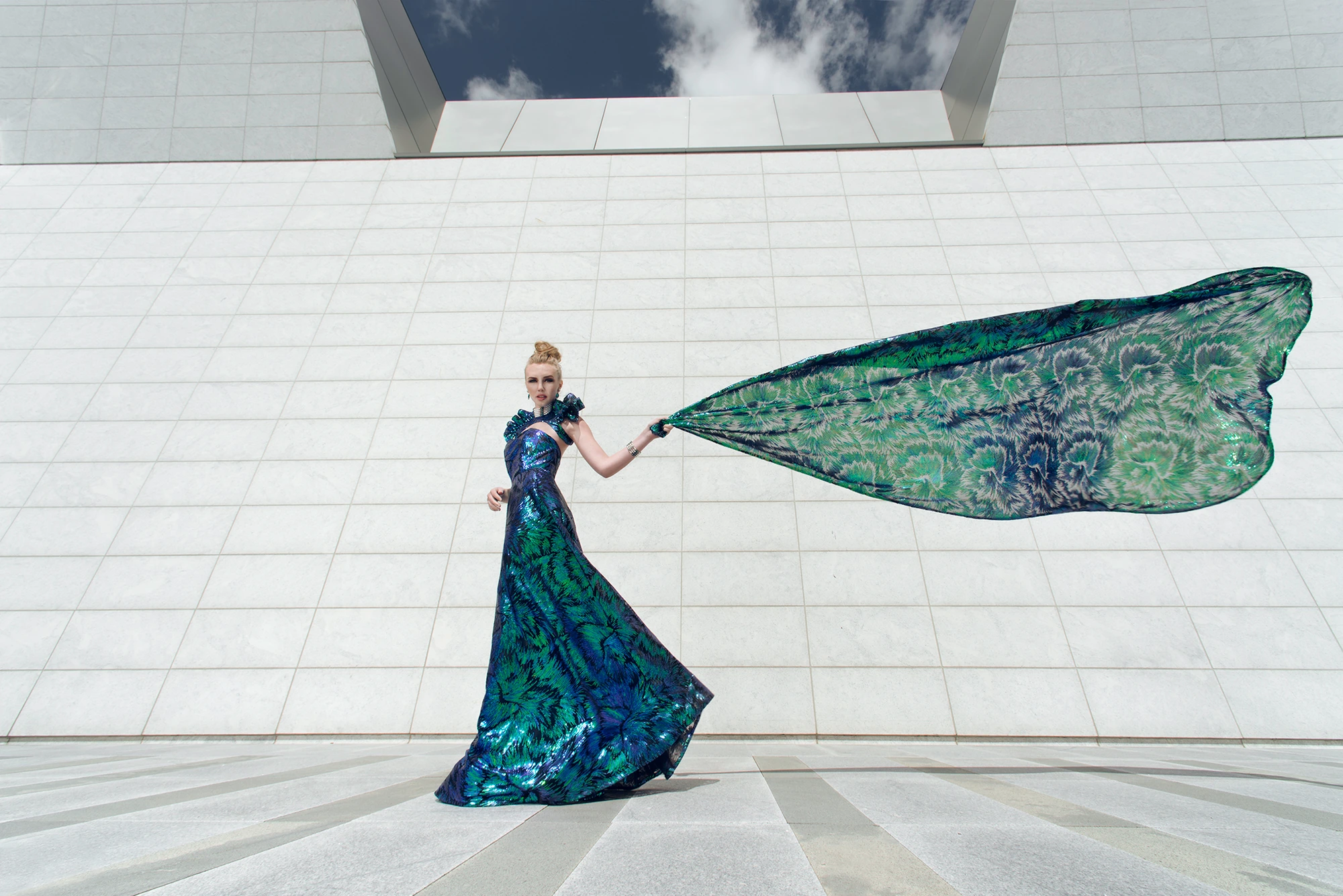 Fashion portrait in a vibrant green dress that fits campaign-style social posts
